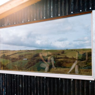 View of people inside sauna, high above Wye Valley